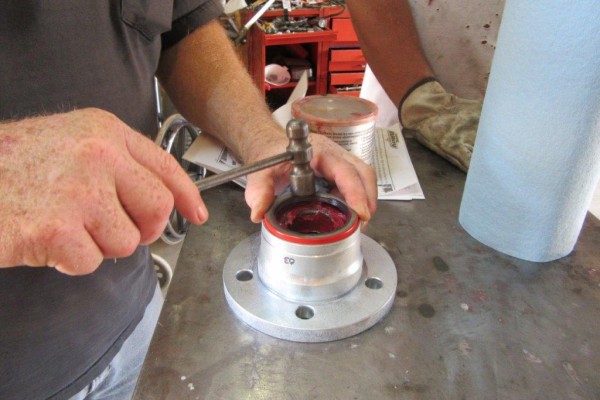 tapping a bearing into a hub with a small hammer