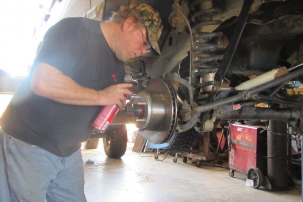 cleaning a brake rotor prior to wheel installation