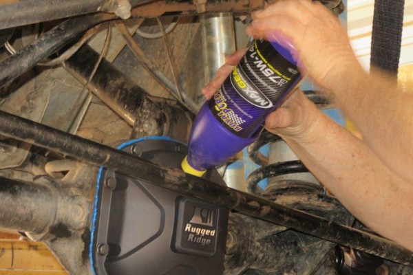 filling a rear axle assembly with gear oil