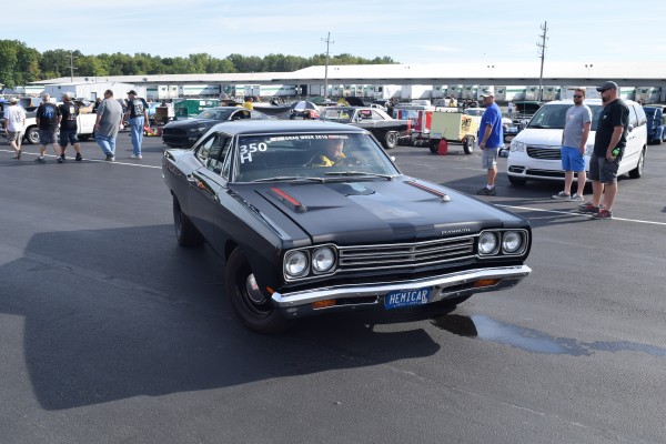 a plymouth roadrunner hemi at a dragstrip
