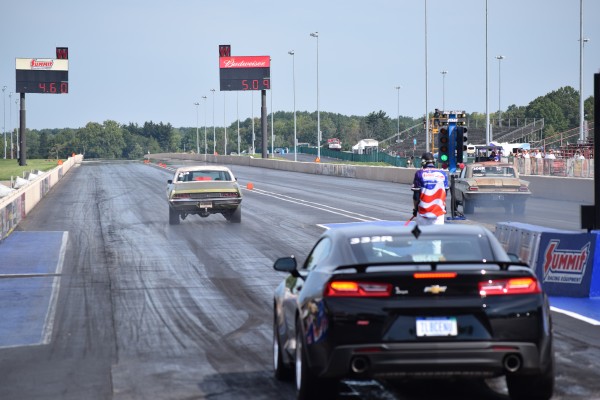 chevy camaro late model preparing to stage at a drag strip