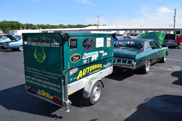 race car pulling a race trailer at hot rod drag week