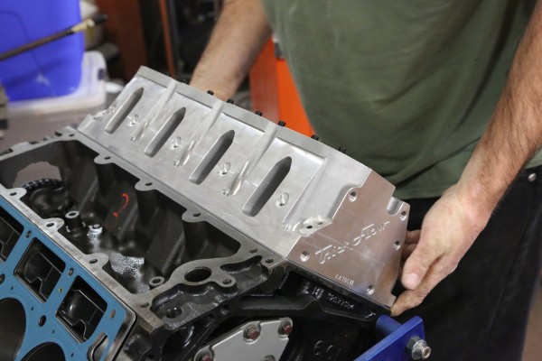 trick flow gm ls cylinder head getting installed