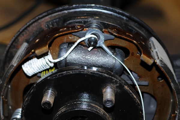 spring and cable installed on jeep yj wrangler drum brake