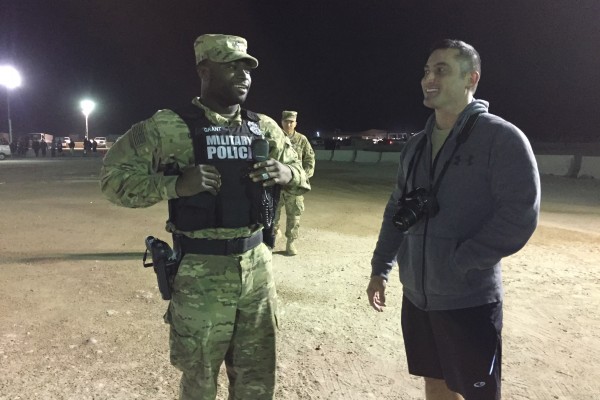 military troops prepping for monster truck show on base