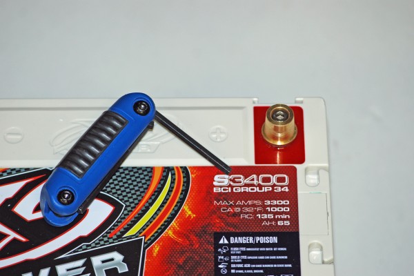 allen wrench used on an automotive battery terminal