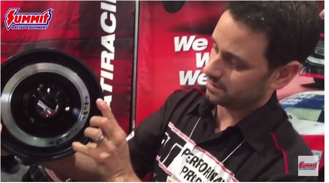 man holding ati damper at trade show