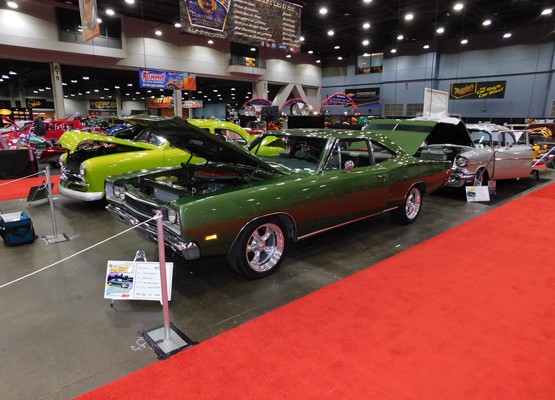 green plymouth road runner muscle car at indoor car show