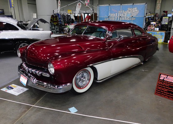mercury lead sled roadster at indoor car show