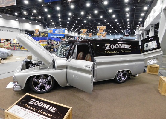 custom panel delivery truck at car show