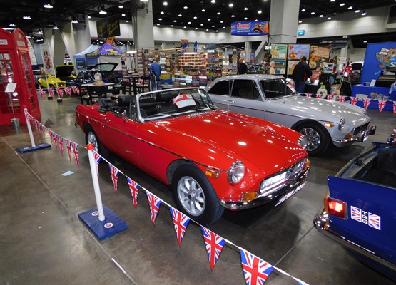 red mg roadster at indoor car show