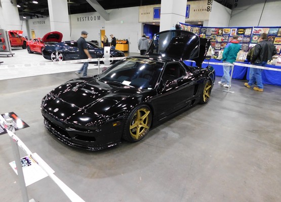 black customized honda acura nsx at indoor car show