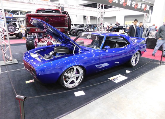 blue customized chevy camaro show car