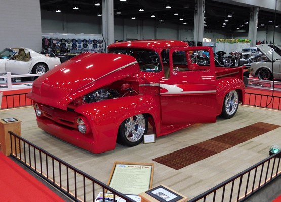 red custom truck at car show