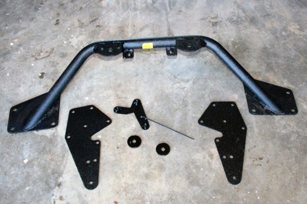 off road bumper parts spread out on garage floor