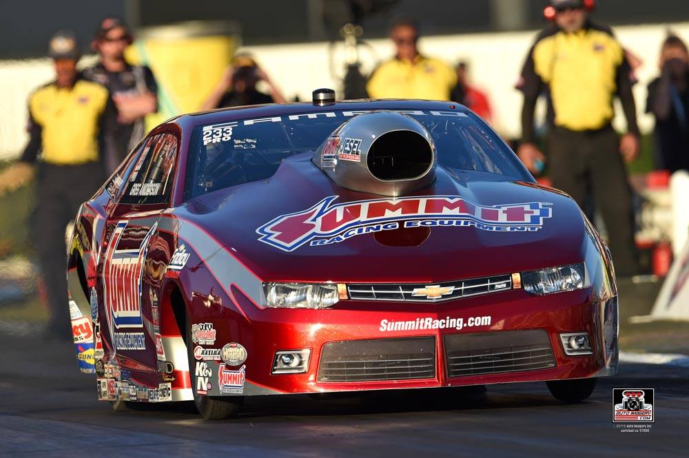 greg anderson's summit racing nhra pro stock camaro on drag strip