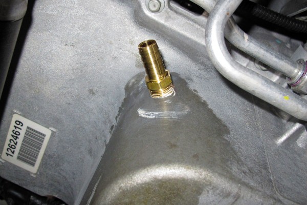hose barb installed onto oil pan
