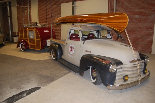 chevy 3100 vintage truck with canoe an woody trailer