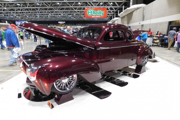 custom purple hot rod on display at car show