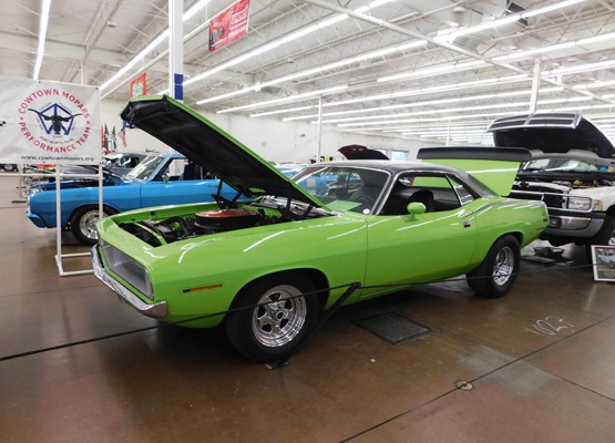 green plymouth barracuda muscle car