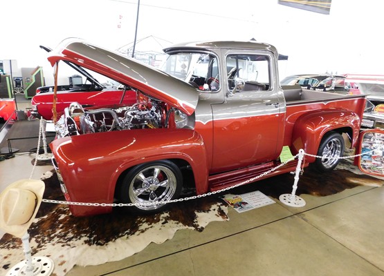 vintage customized pickup truck at indoor car show