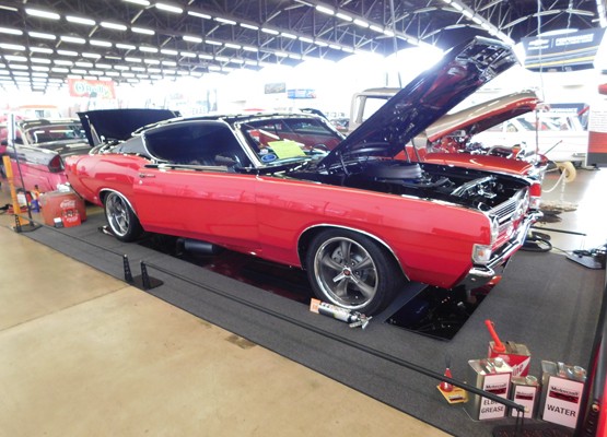 customized muscle car at indoor car show
