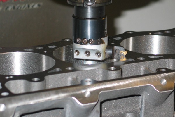 chamfering the tops of engine cylinder bores