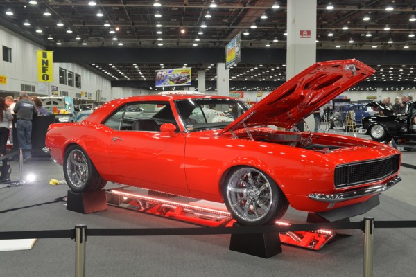 orange 1968 customized chevy camaro