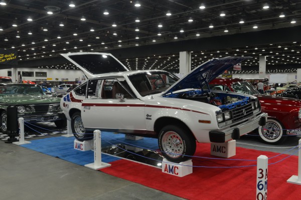 amc spirit hatchback coupe on display at a car show