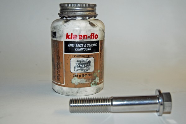 bolt and jar of anti seize compound