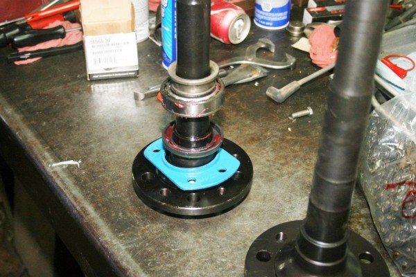 axle flanges placed on a workbench
