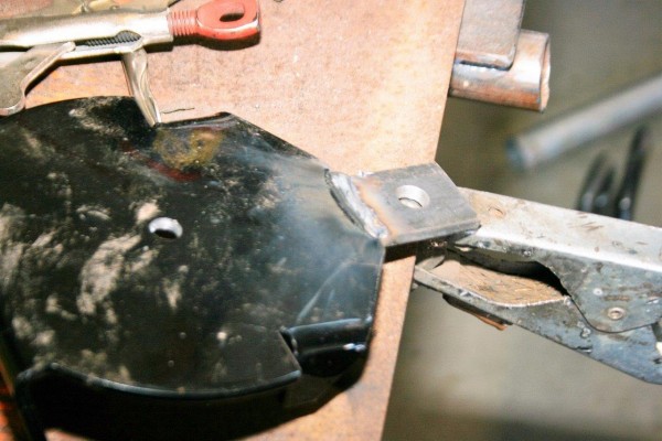 welding a tab on a metal plate