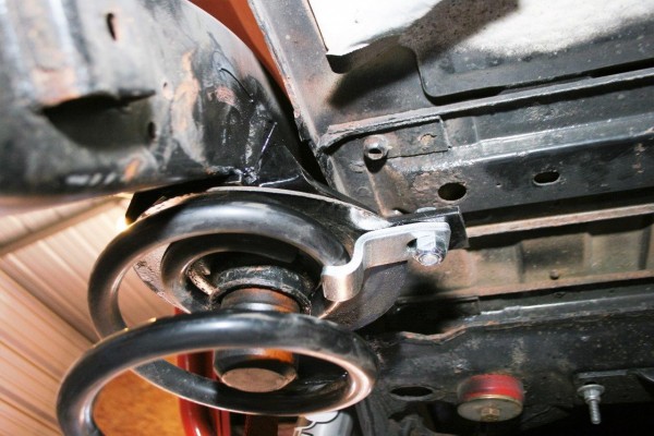 rear coil spring perch on a jeep
