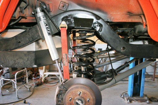 rear coil spring arch on a jeep wrangler