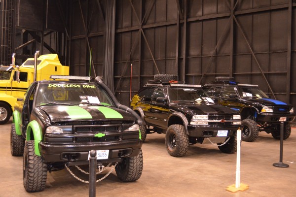 row of s-10 and blazer off road trucks