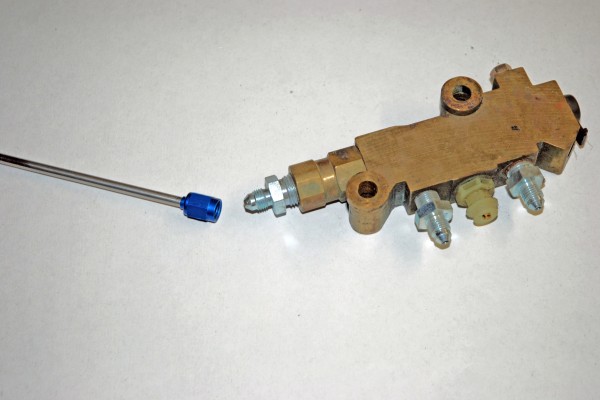 an adapter installed in a brake combination valve