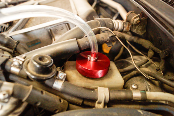 a pressure cap installed on a brake master cylinder