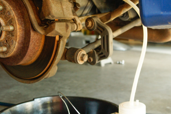 using a motive brake bleeder on a disc brake car