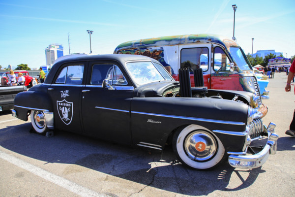 las vegas raiders hot rod at a car show