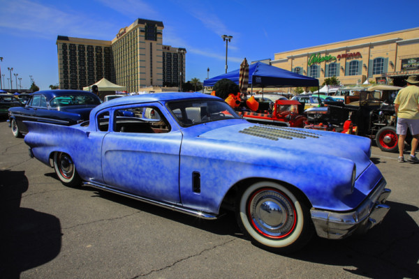 classic studebaker hot rod coupe at a car show