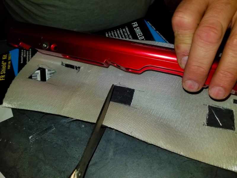 installing heat shield on fuel rails