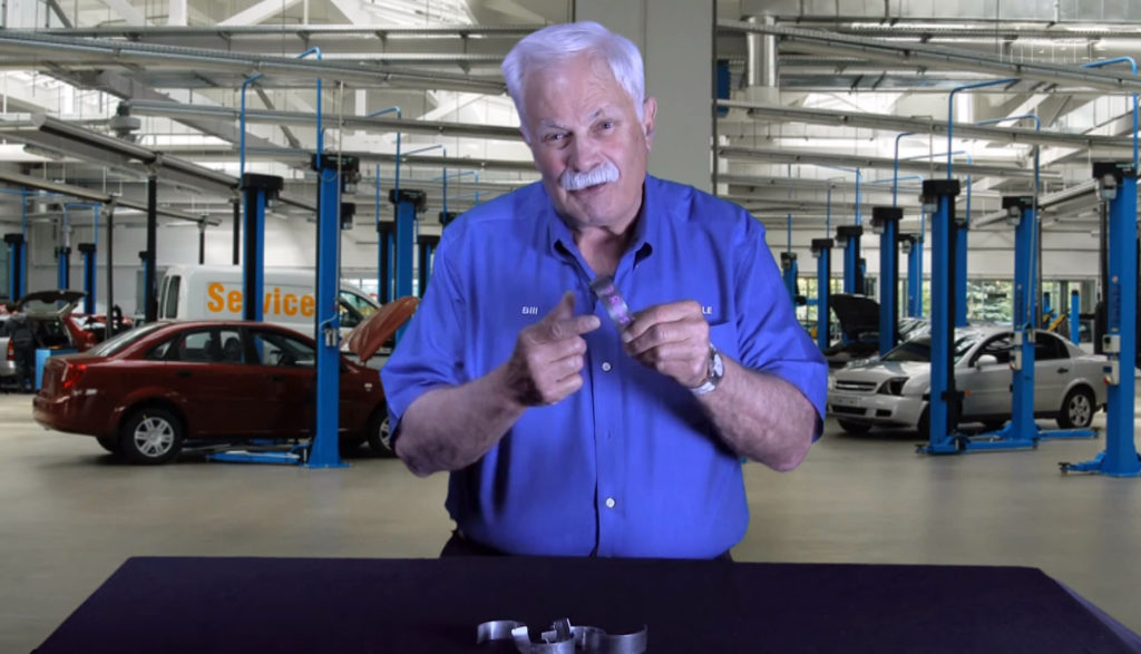 man explaining engine bearing failure signs