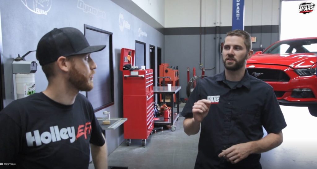 Horsepower wars hosts talking in garage