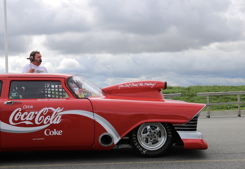 coca-cola themed drag race car at tierp arena sweden