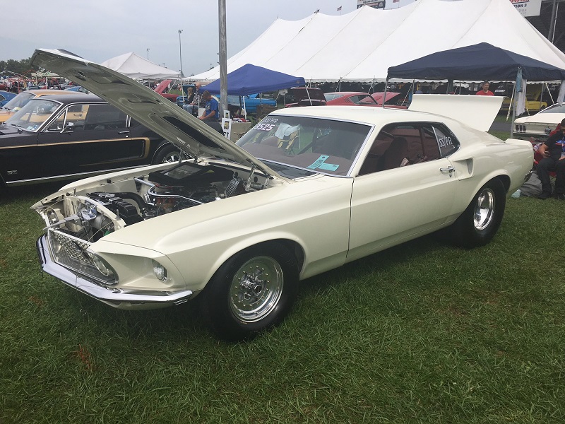 white classic ford mustang
