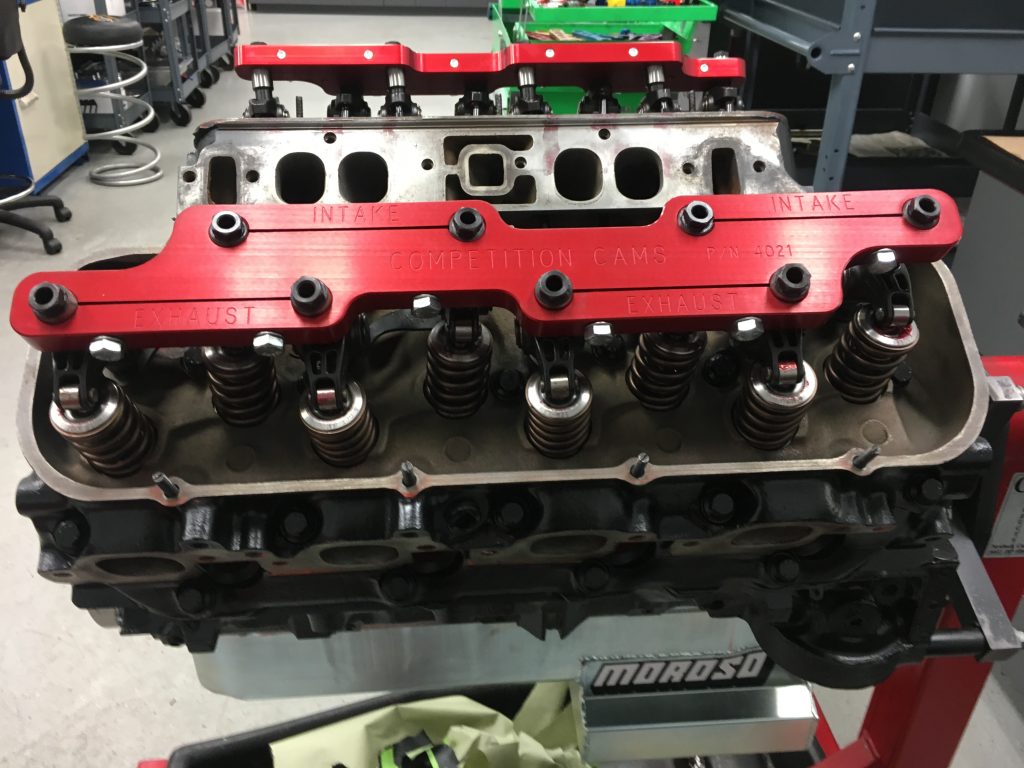 big block chevy v8 with valve covers removed to show rocker stud girdles