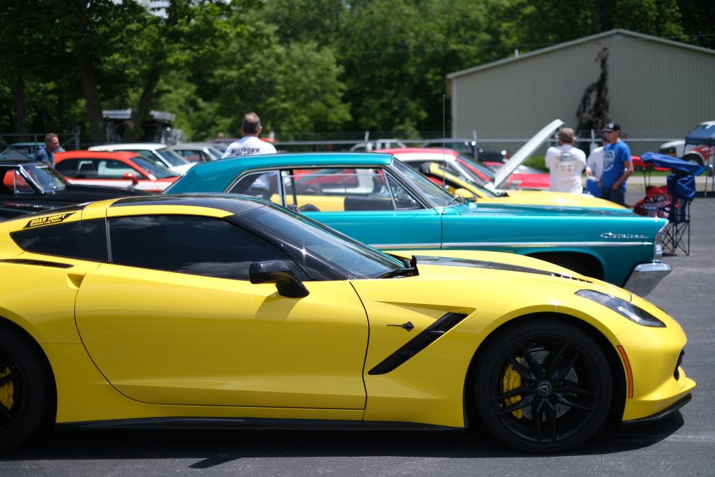row of cars at a car show