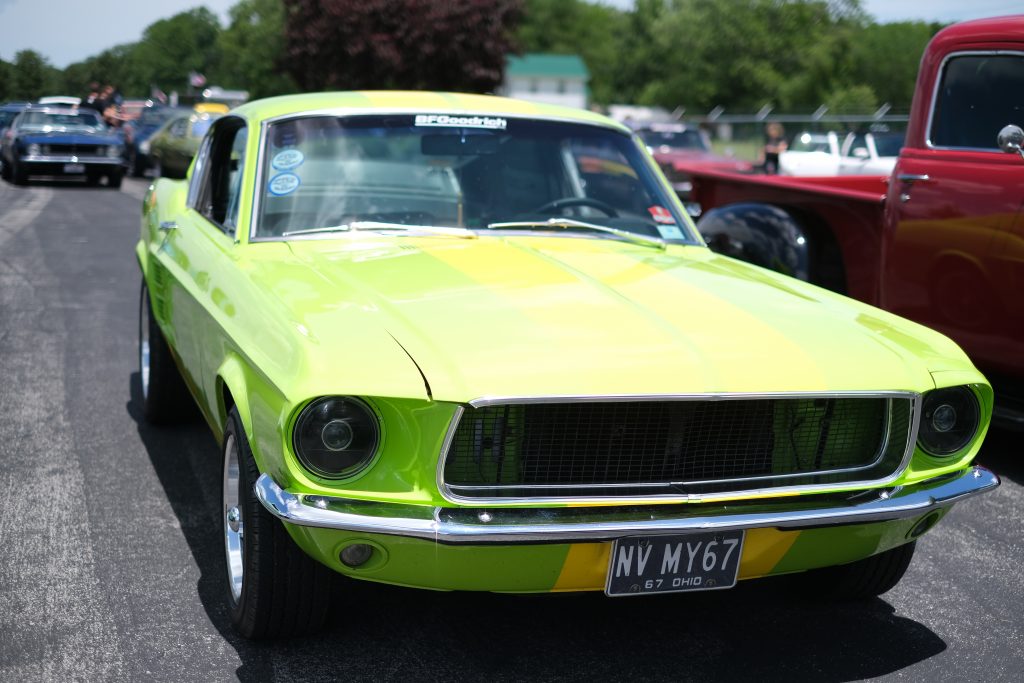 yellow 1967 ford mustang fastback