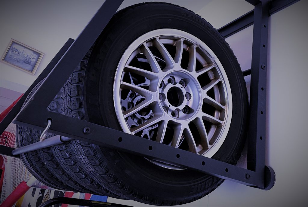 Winter Snow Tires on a Wall Storage Rack