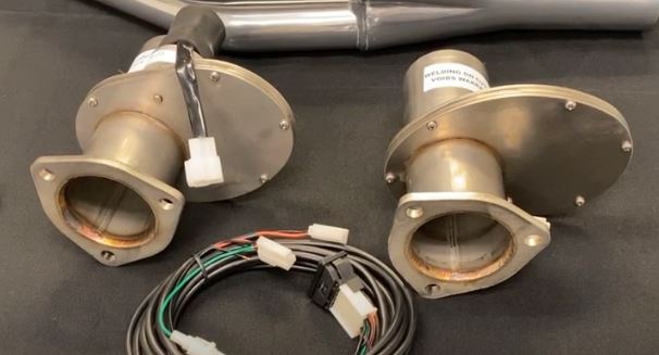 a pair of doug's custom exhaust cut outs